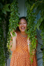 Load image into Gallery viewer, The 'Bad b*tch o'clock' dress - Retro orange midi daisy dress - Made to measure!